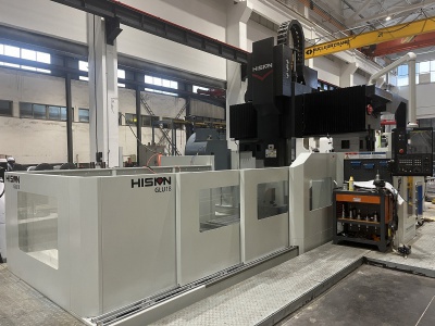 Fixed beam gantry machining center